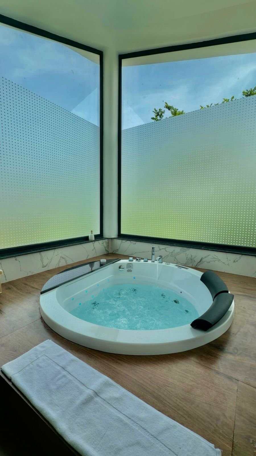 A marble en-suite bathroom at Palmwood Hills — 1