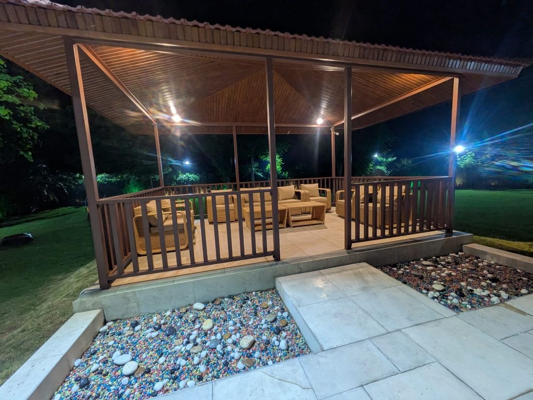 The timber pavilion on the lawn at Palmwood Hills