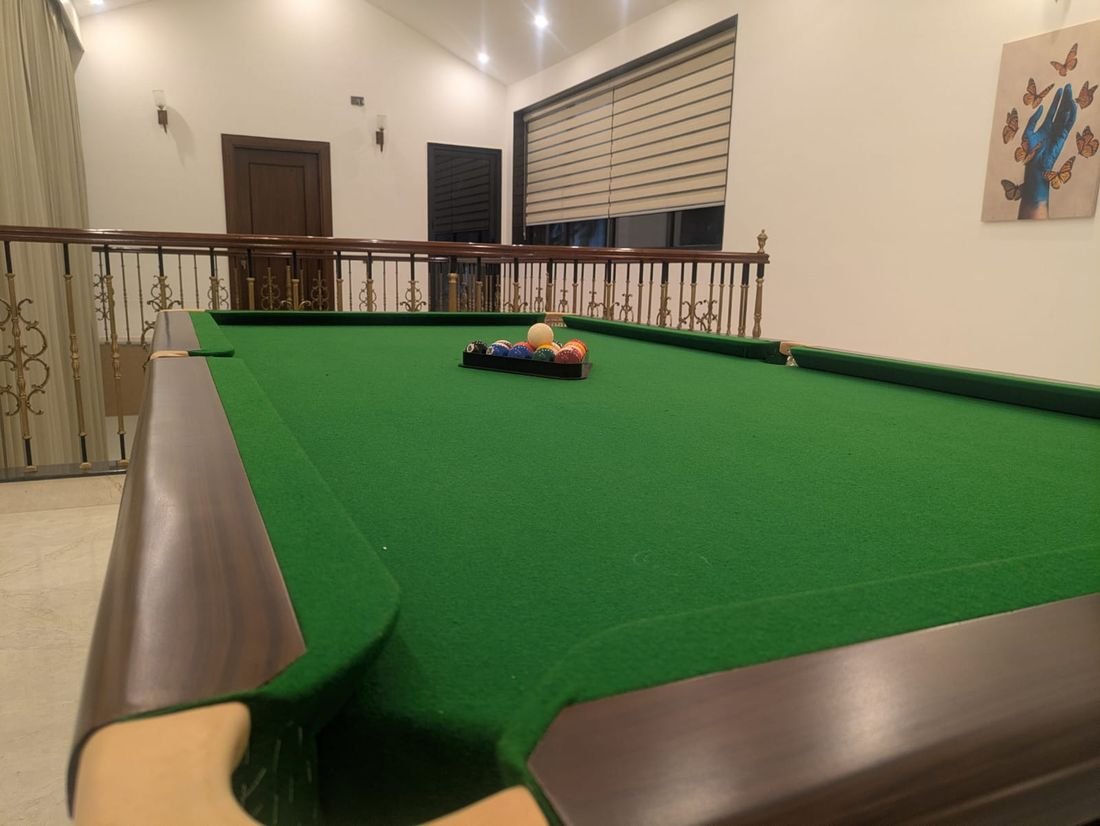 The games room at Palmwood Hills with a full-size snooker table
